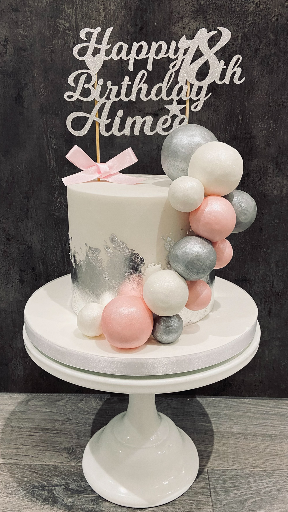 Stylish 18th birthday cake with silver leaf