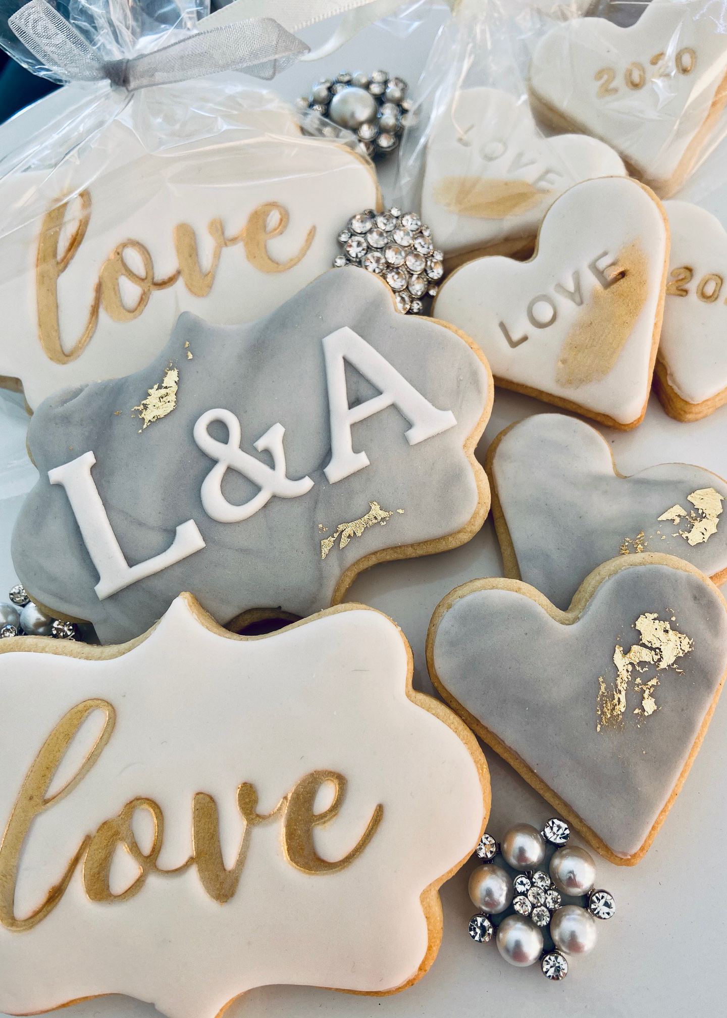 White gold and grey wedding favour iced biscuits