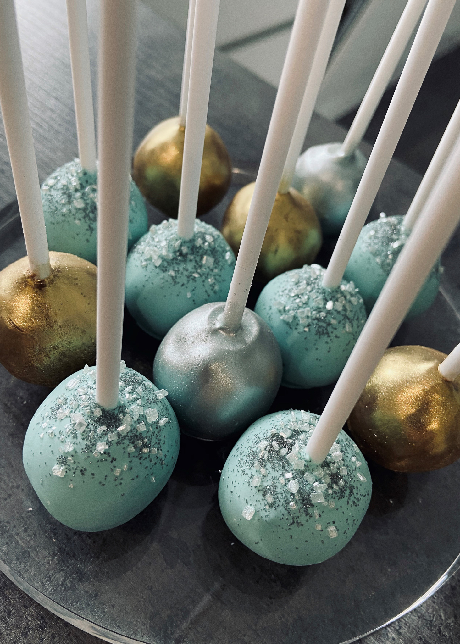 Teal silver and gold cake pops