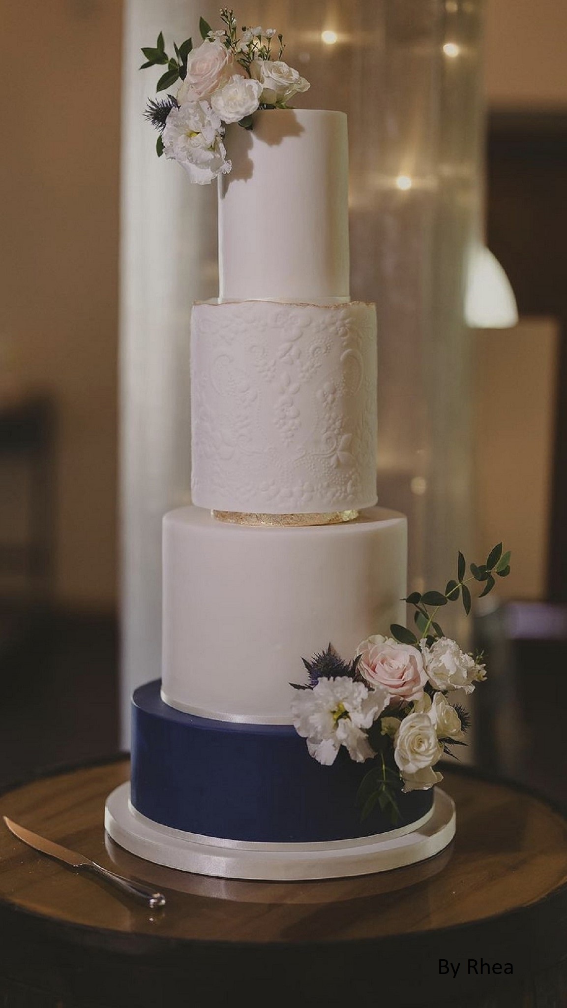 Luxury wedding cake navy blue gold flowers Logie Country House Aberdeenshire Scotland