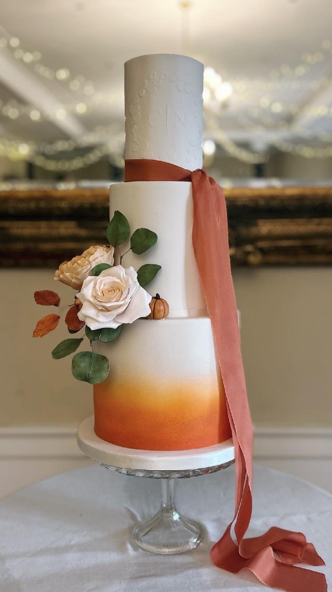 3 tiers burnt orange satin ribbon autumn luxury wedding cake airbrushed Pittodrie House Aberdeenshire Scotland