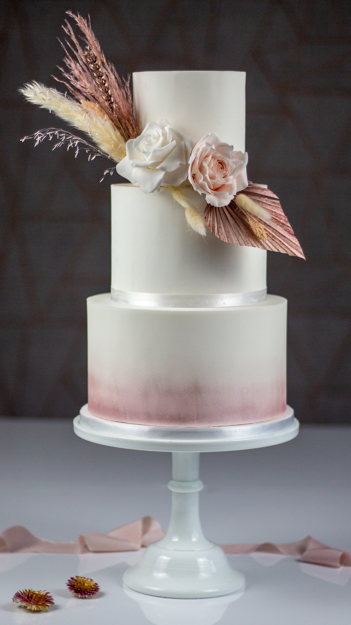Pink Air Brushed Wedding Cake with Sugar Roses and dried blooms